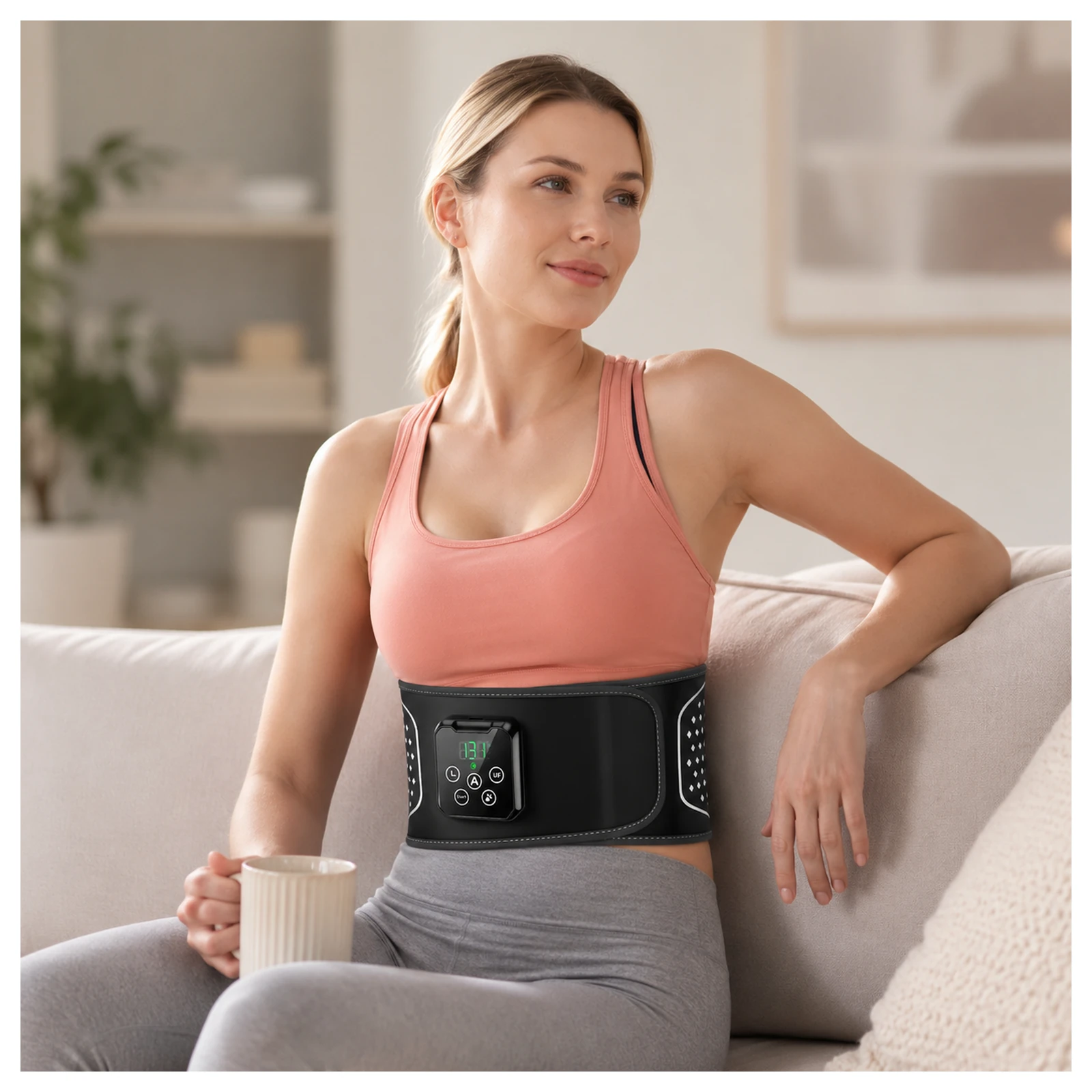 Woman wearing the LK-WM01 air compression heated massage belt while relaxing at home.